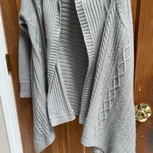Light gray sweater with longer sides